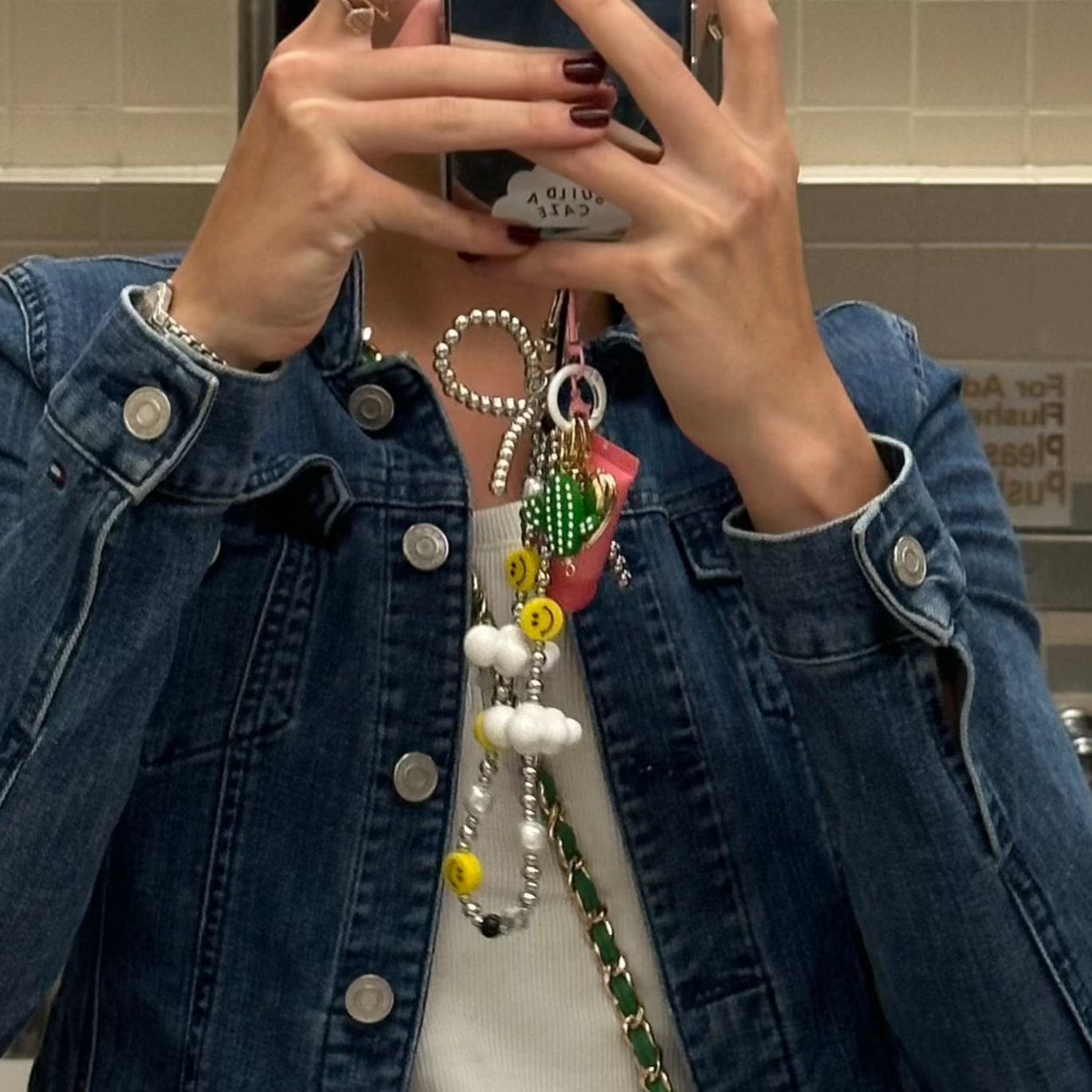 Phone wrist strap multicolor rainbow beads, white cloud charms, and happy smiley face beads Build A Caze