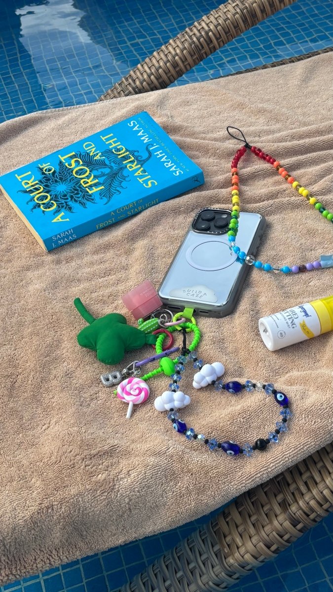 Phone lanyard blue and white eye and cloud charms Build A Caze