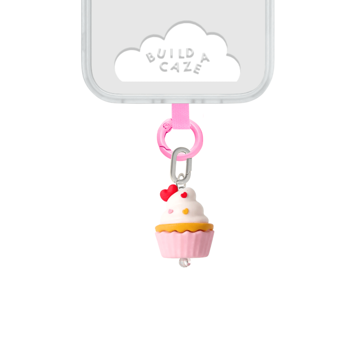 Adorable cupcake phone charm with pink frosting and sprinkles, cute Y2K aesthetic mobile accessory and decorative tech strap for phone cases by Build a Caze.