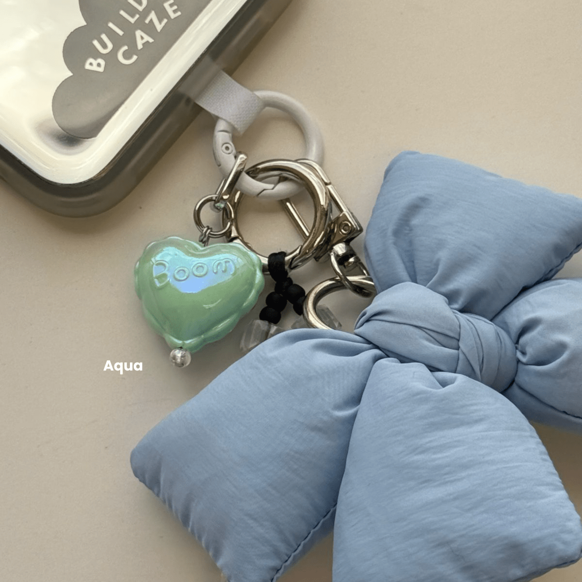 Mint 2.0 Pastel Hot Love Balloon Charmie Charm dangly accessory attached to a phone - Build A Caze
