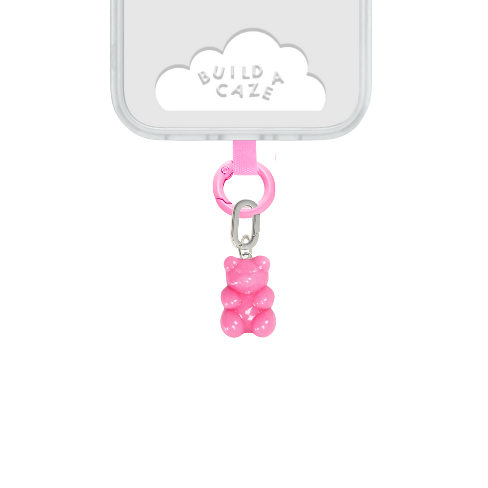 Cute bubblegum pink gummy bear phone charm, nostalgic Y2K aesthetic mobile accessory and decorative strap for phone cases by Build a Caze.