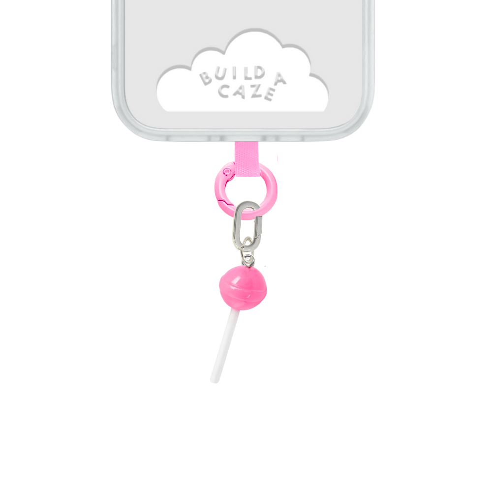 Pink lollipop phone charm with an iconic candy shape, nostalgic Y2K aesthetic mobile accessory and decorative tech strap for phone cases by Build a Caze.