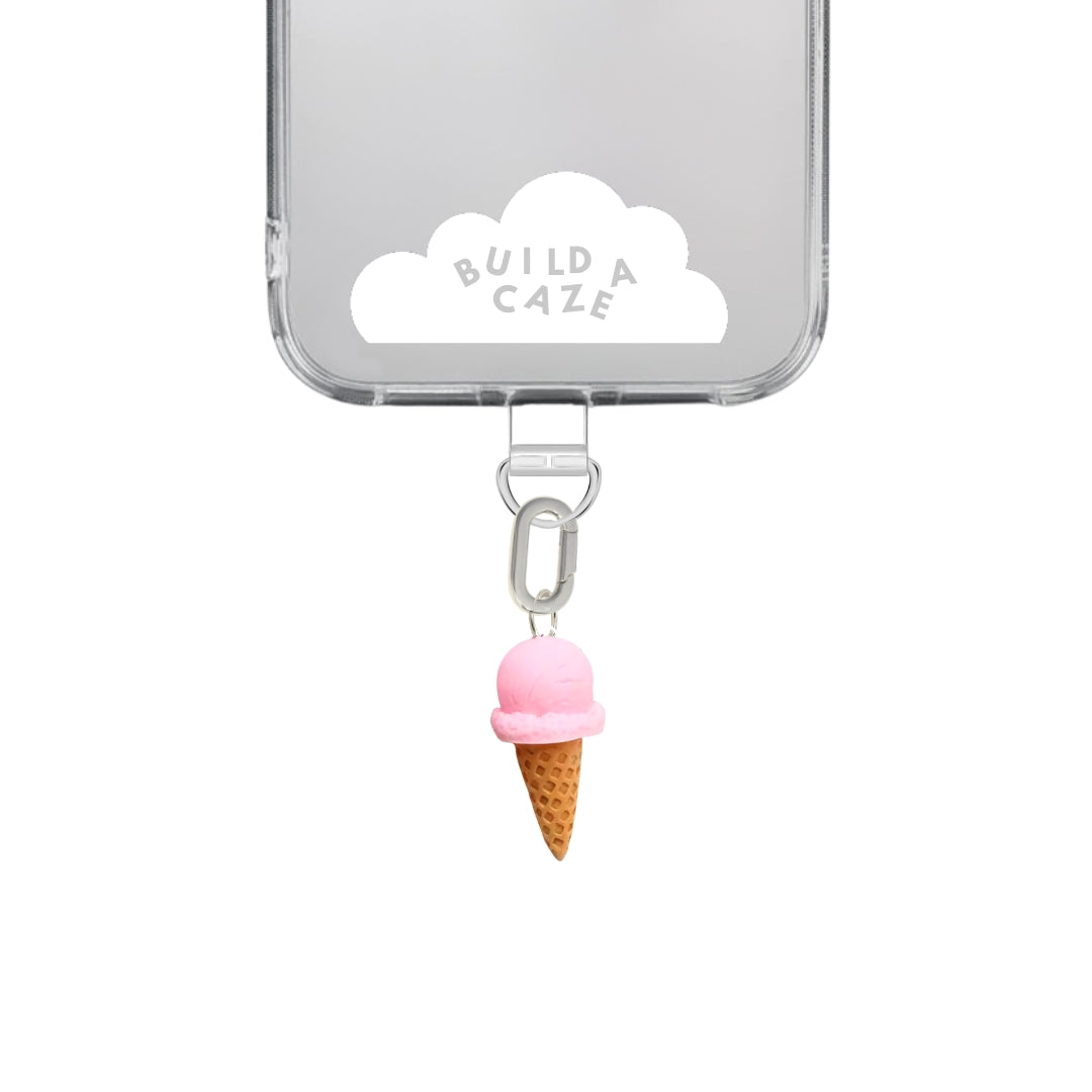 Adorable pink and brown strawberry ice cream cone phone charm, 3D berry cone food accessory for mobile cases and Y2K aesthetic tech styling by Build a Caze.