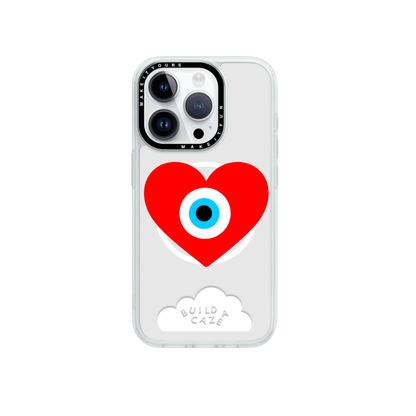 Red heart with protective eye design MagSafe pop holder, bold red magnetic pop socket and phone grip accessory.