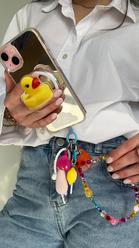 Yellow rubber ducky MagSafe pop holder, cute duck-shaped magnetic pop socket and phone grip accessory.
