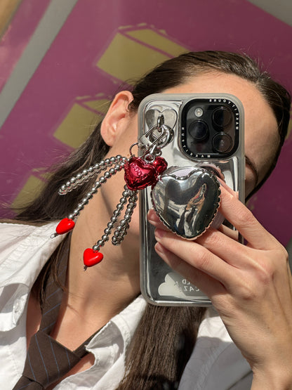 Pretty Tied Up white bow keychain with purple hearts and a pearl string, aesthetic coquette bag charm, cute phone case accessory, feminine ribbon lanyard for keys and backpacks.
