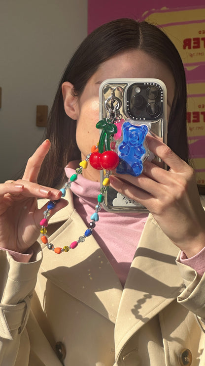 Cool blue gummy bear MagSafe pop holder, cute translucent blue candy-inspired magnetic pop socket and phone grip accessory.