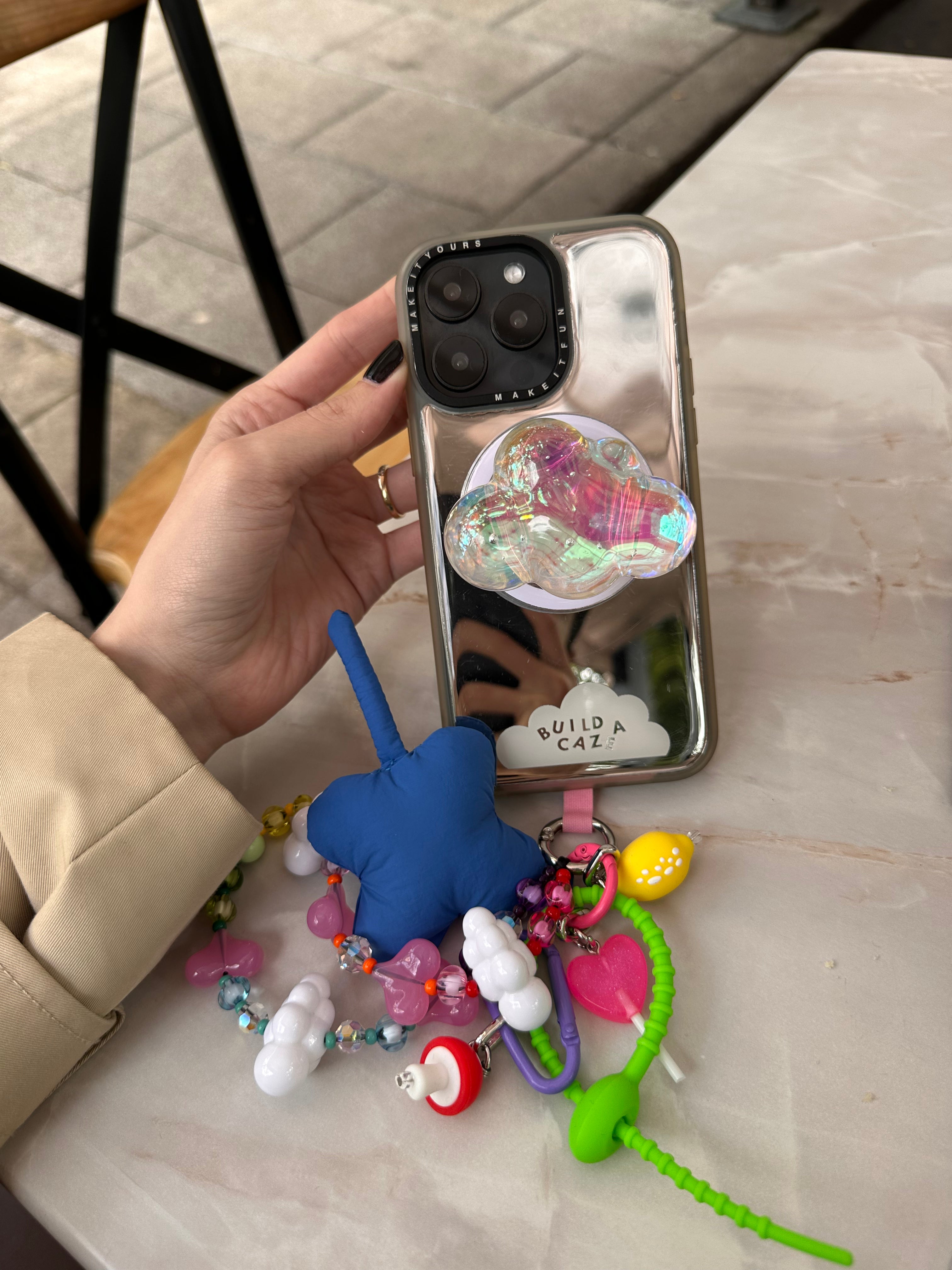 Holo Head in the Clouds holographic cloud MagSafe pop holder, shimmering magnetic pop socket and phone grip accessory.