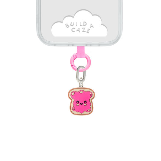 Brown and pink Jammy Toastie Charmie charm and dangly accessory shown against a plain background - Build A Caze