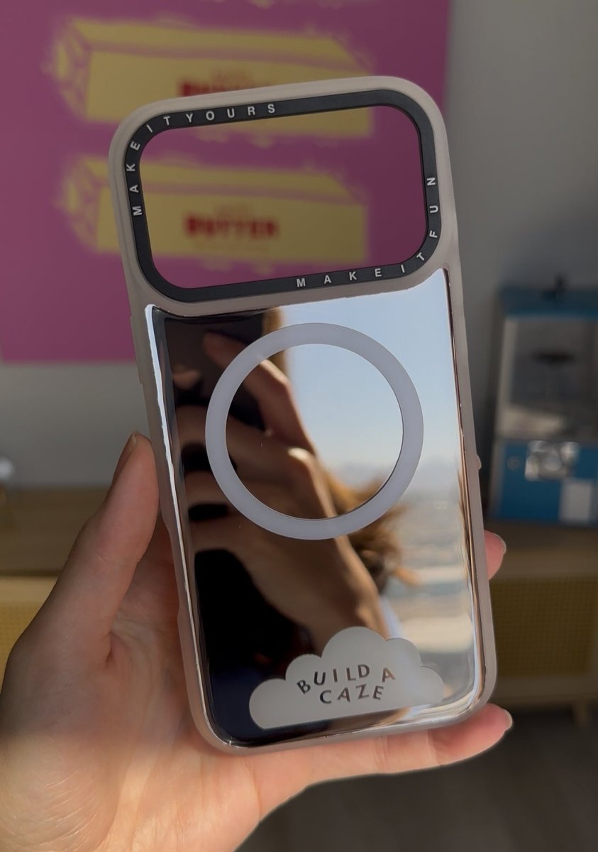 Anti-scratch MagSafe mirror phone case for iPhone 17 featuring 10ft drop protection, epoxy coating, and a reflective silver back cover.