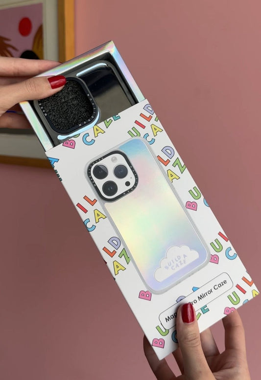 Silver MagSafe mirror phone case for iPhone 16 Plus featuring 10ft drop protection and a reflective back cover.