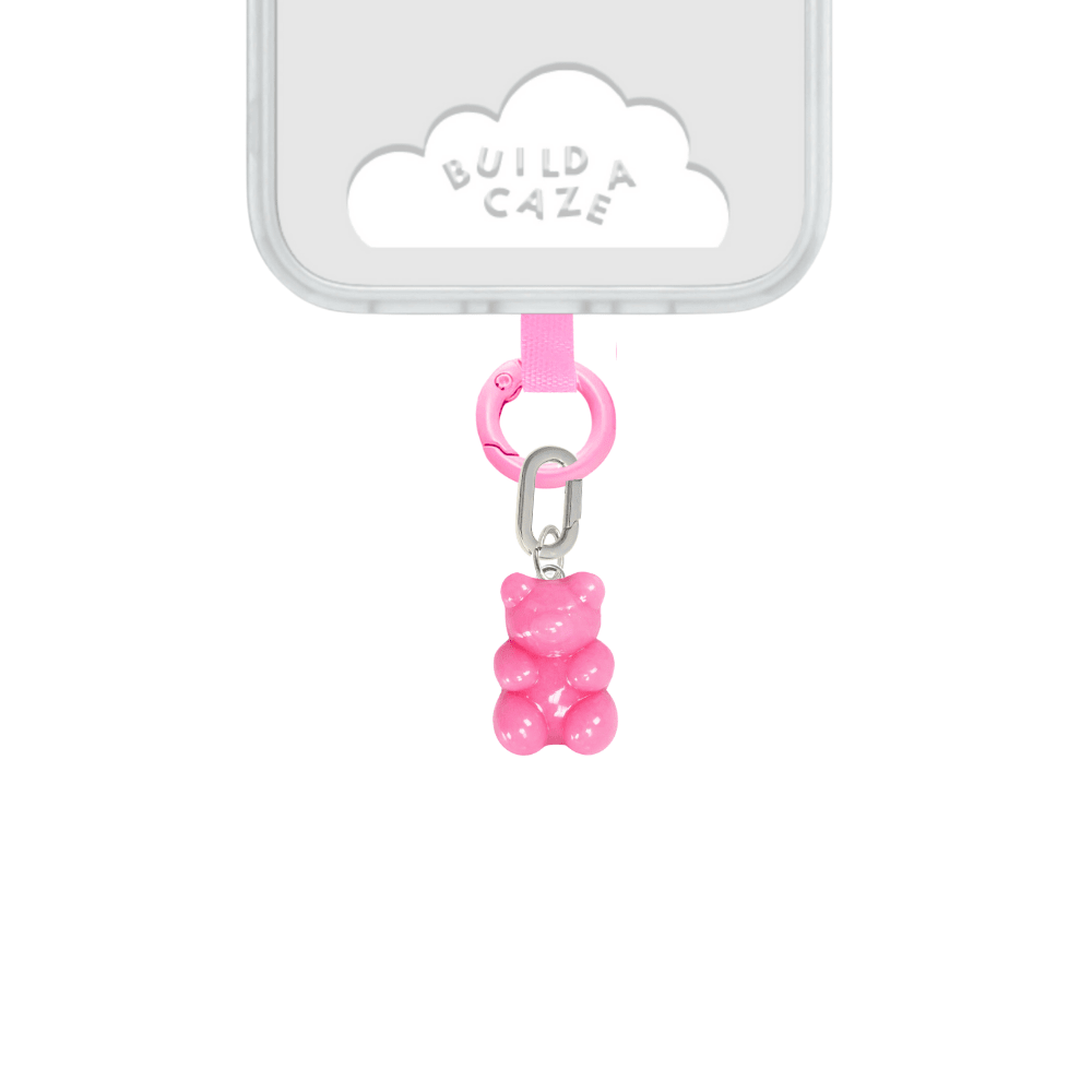 Cute bubblegum pink gummy bear phone charm, nostalgic Y2K aesthetic mobile accessory and decorative strap for phone cases by Build a Caze.