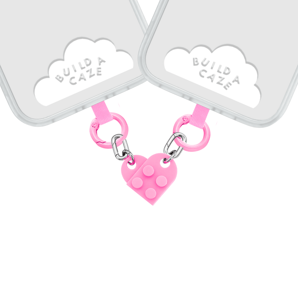 Romantic red and white heart-shaped phone charm with a 3D building block design, cute Y2K aesthetic mobile accessory and decorative tech strap by Build a Caze.