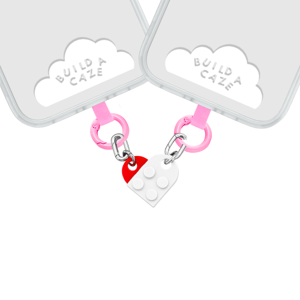 Buildin' Love heart-shaped phone charm with a cute 3D design, trendy Y2K aesthetic mobile accessory and decorative tech strap for phone cases by Build a Caze.