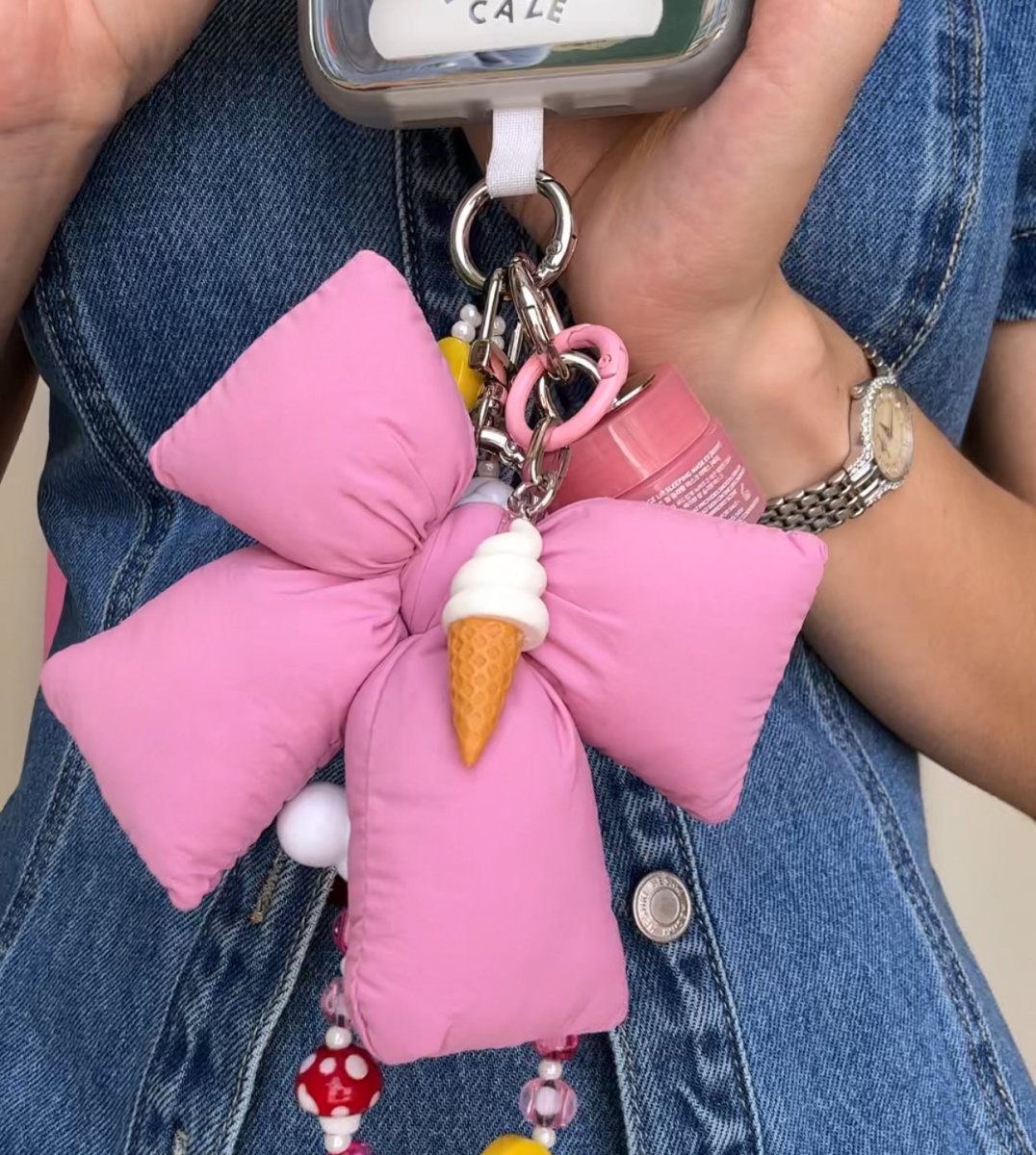 Classic vanilla ice cream scoop phone charm with a 3D waffle cone design, cute food-themed mobile accessory and Y2K aesthetic tech decoration by Build a Caze.