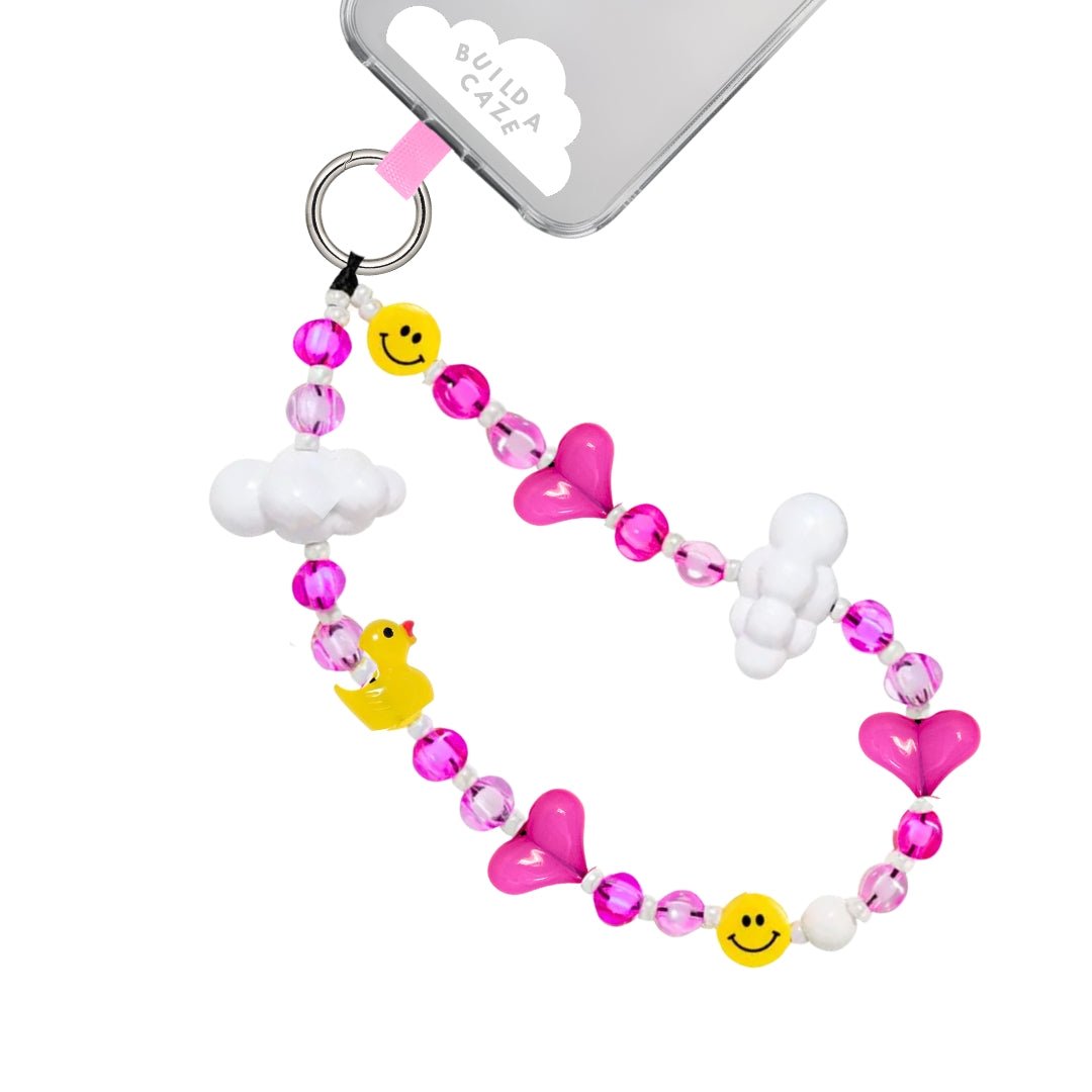 Phone wrist strap bright pink hearts, sparkly beads, white clouds, and happy yellow duck and smiley cell Phone Build A Caze
