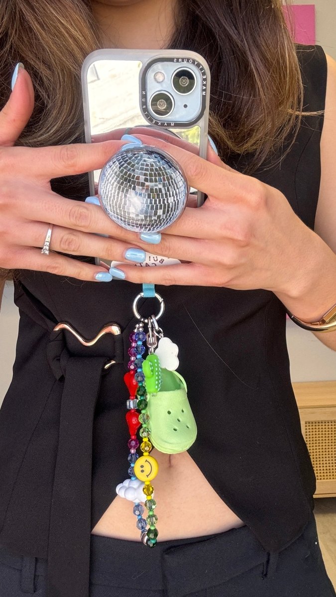 Disco night fever holographic disco ball magsafe pop holder, silver magnetic pop socket and phone grip accessory.