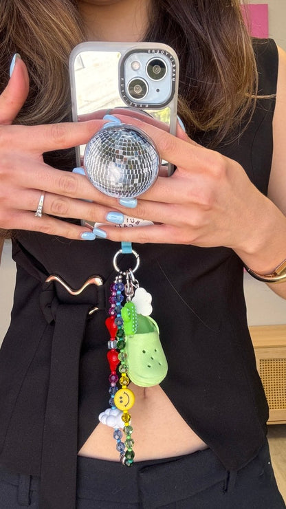 Disco night fever holographic disco ball magsafe pop holder, silver magnetic pop socket and phone grip accessory.