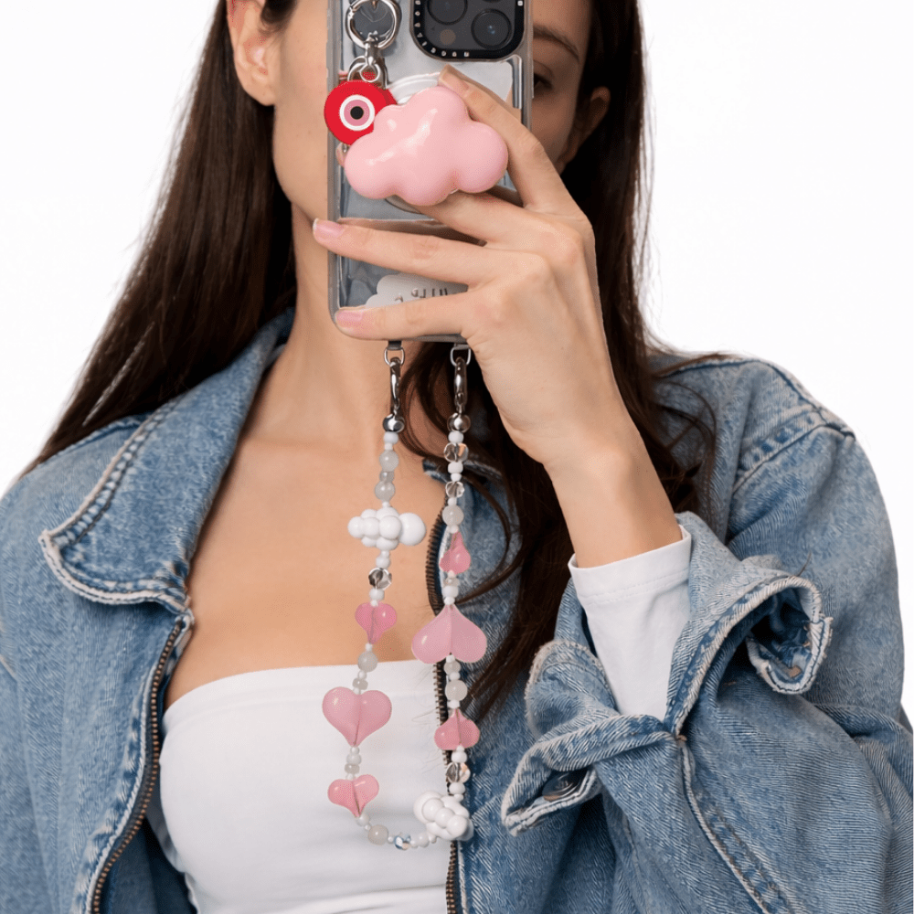 Durable double link metal connector for phone charms and straps, sleek metallic attachment for mobile case accessories and Y2K aesthetic tech styling by Build a Caze.