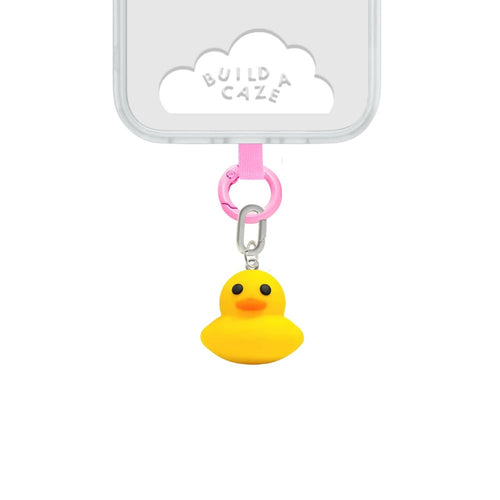 Adorable yellow duck phone charm, a quirky 3D rubber ducky mobile accessory and quacking grip for MagSafe cases by Build a Caze.