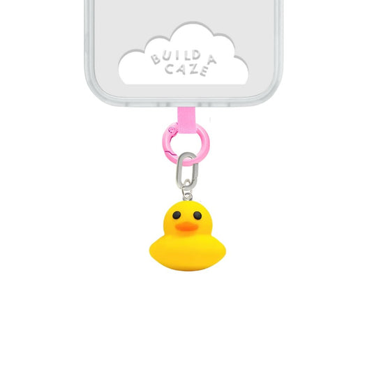 Adorable yellow duck phone charm, a quirky 3D rubber ducky mobile accessory and quacking grip for MagSafe cases by Build a Caze.