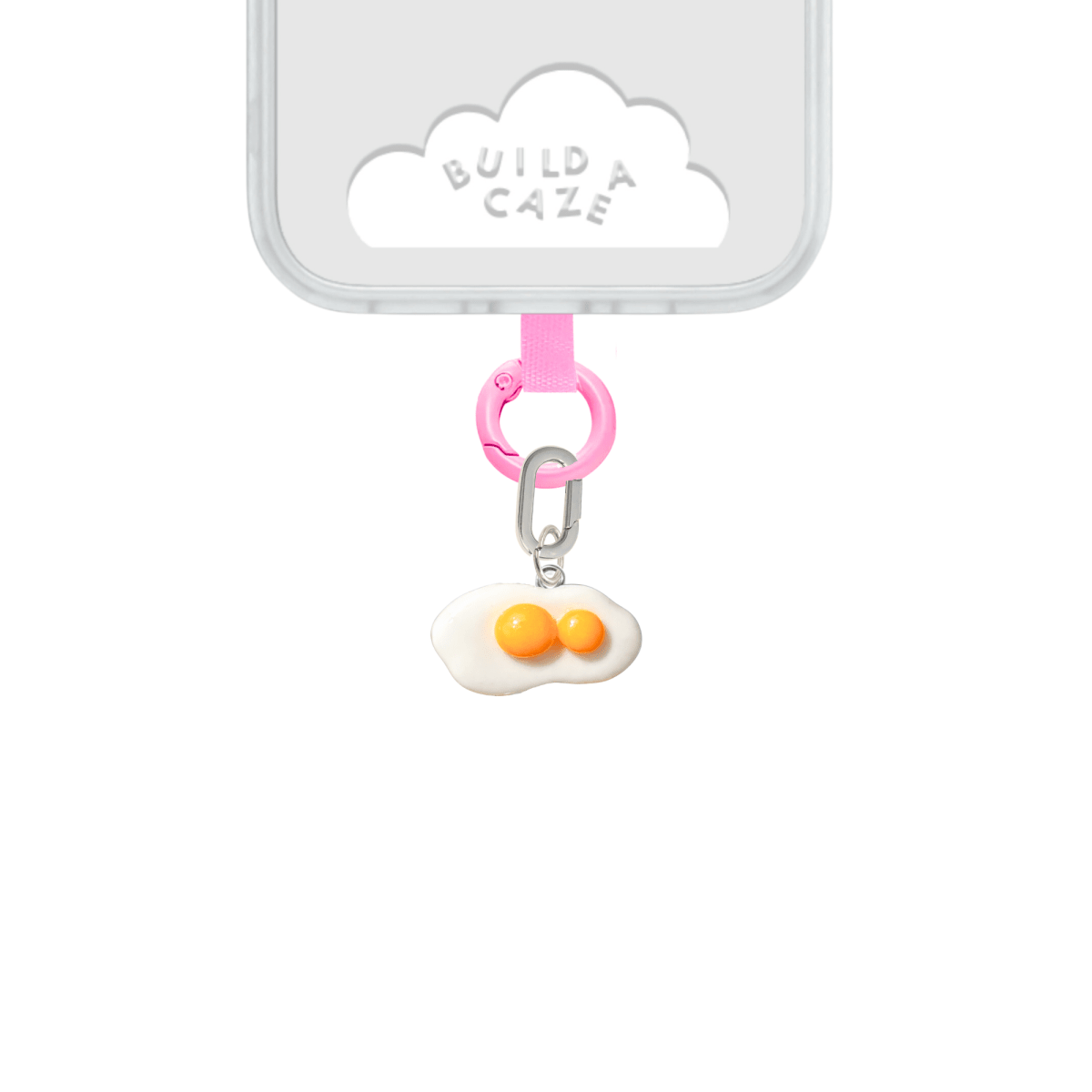 Cute double yolk sunny-side-up egg phone charm, bright white and orange 3D food accessory for mobile cases by Build a Caze.