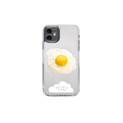 Eggscellent sunny side up egg MagSafe pop holder, white and orange fried egg magnetic pop socket and phone grip accessory.