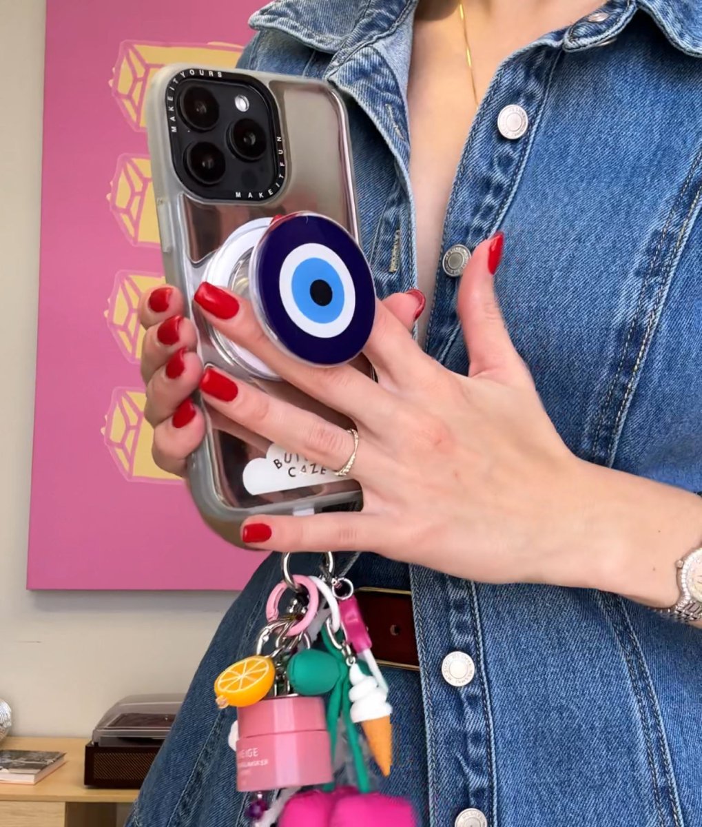 Got My Eye On You Pop Grippy featuring a large blue evil eye design, MagSafe compatible magnetic phone holder and secure pop socket grip for mobile accessories.