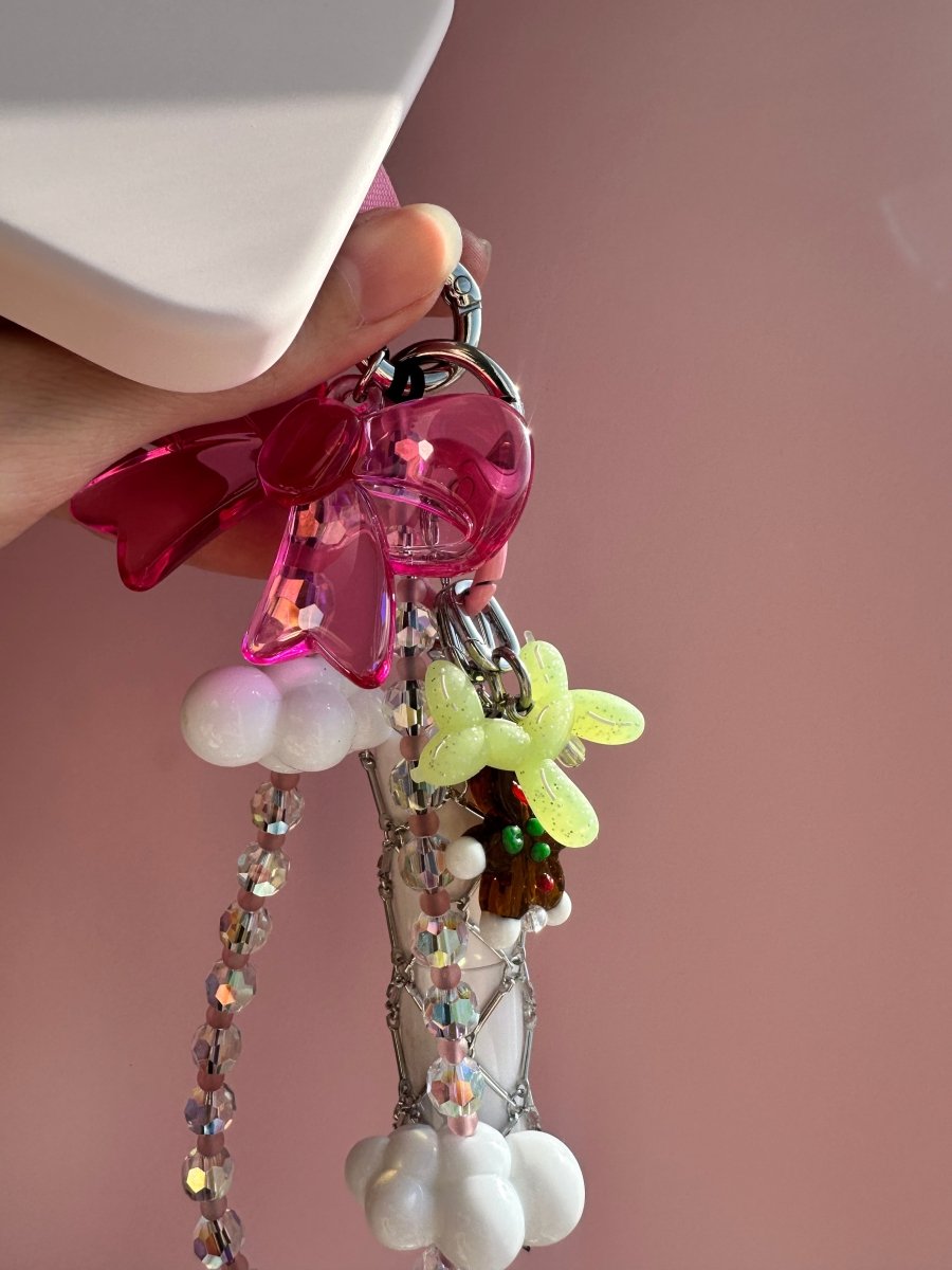 Green bubble bark phone charm with a textured, bubbly design, cute Y2K aesthetic mobile accessory and decorative tech strap for phone cases by Build a Caze.