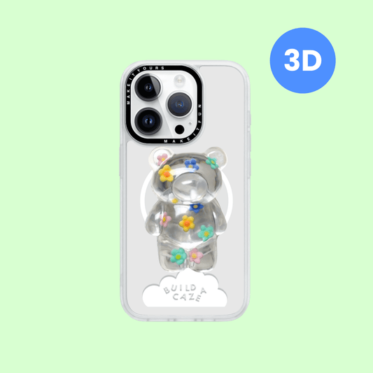 Clear 3D bear-shaped phone grip with floral details. This MagSafe magnetic pop holder and pop socket provides a secure phone grip for iPhones, Kindles, and tablets. A cute, tactile tech accessory.
