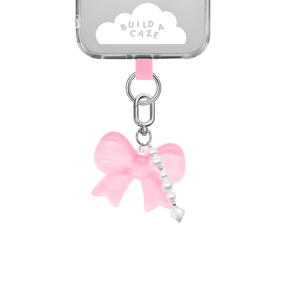 Gummy Pink Bow U Keychain, light pink bow charm with dainty pearls for phone cases and bags, cute aesthetic mobile accessory, sugar rush collection keychain, trendy phone case attachment.