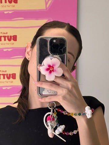 Hibi Baby cute character MagSafe pop holder, pink magnetic pop socket and phone grip accessory.