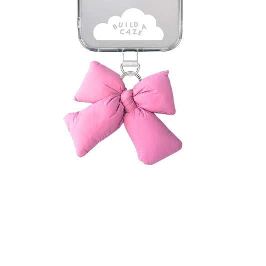 Knoty-Bow Puffy Keychain in baby pink, handmade puffy bow charm for phone cases and bags, cute aesthetic mobile accessory, soft fabric bow keychain attachment.