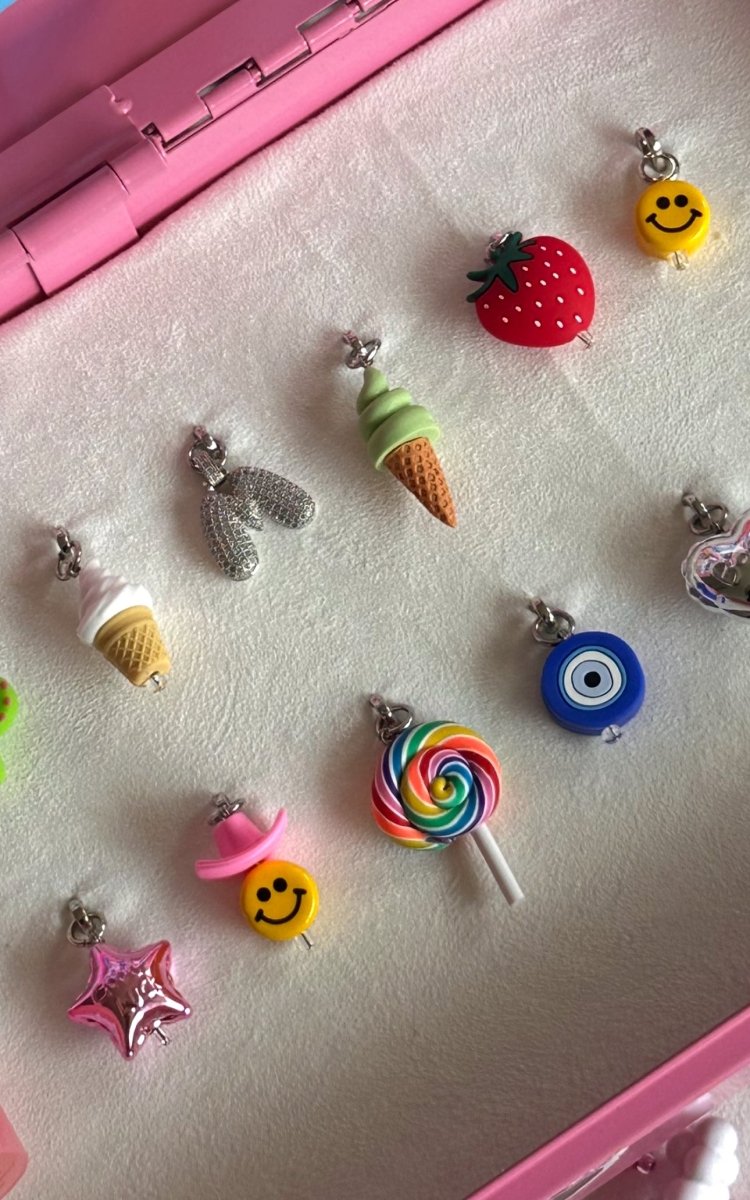 Detailed 3D matcha green tea ice cream scoop phone charm, quirky food-themed mobile accessory and tech decoration for phone cases with a nostalgic Y2K aesthetic by Build a Caze.