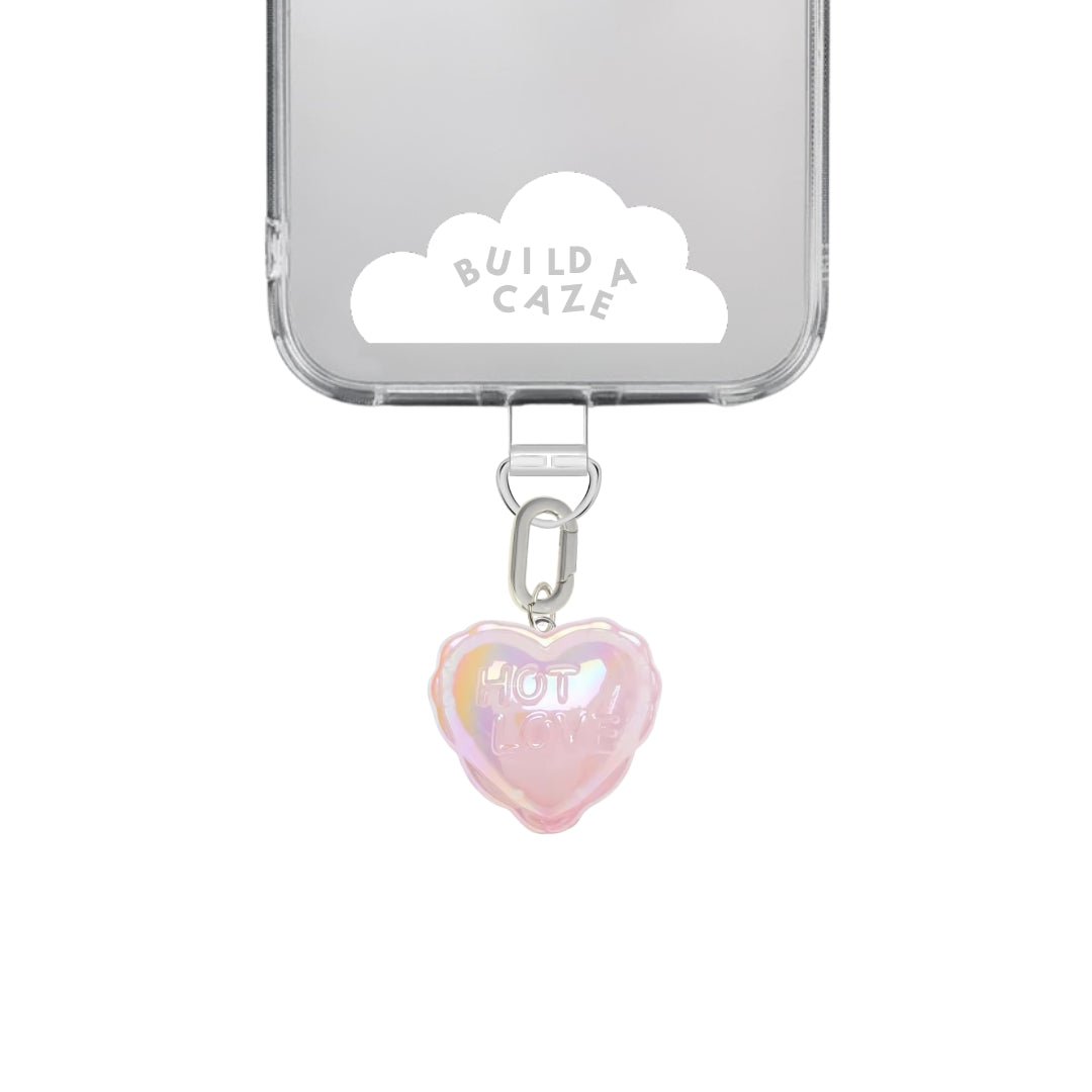 Pastel pink heart-shaped balloon phone charm, cute Y2K aesthetic mobile accessory and quirky heart balloon decoration for phone cases by Build a Caze.