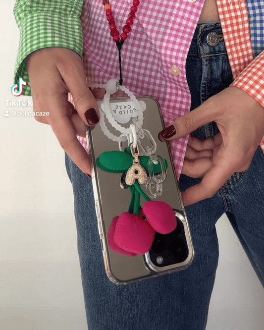 Puffy cherry keychain, cute fruit-themed charm for phone cases and bags, soft aesthetic mobile accessory, red cherry bag charm, trendy keychain attachment.