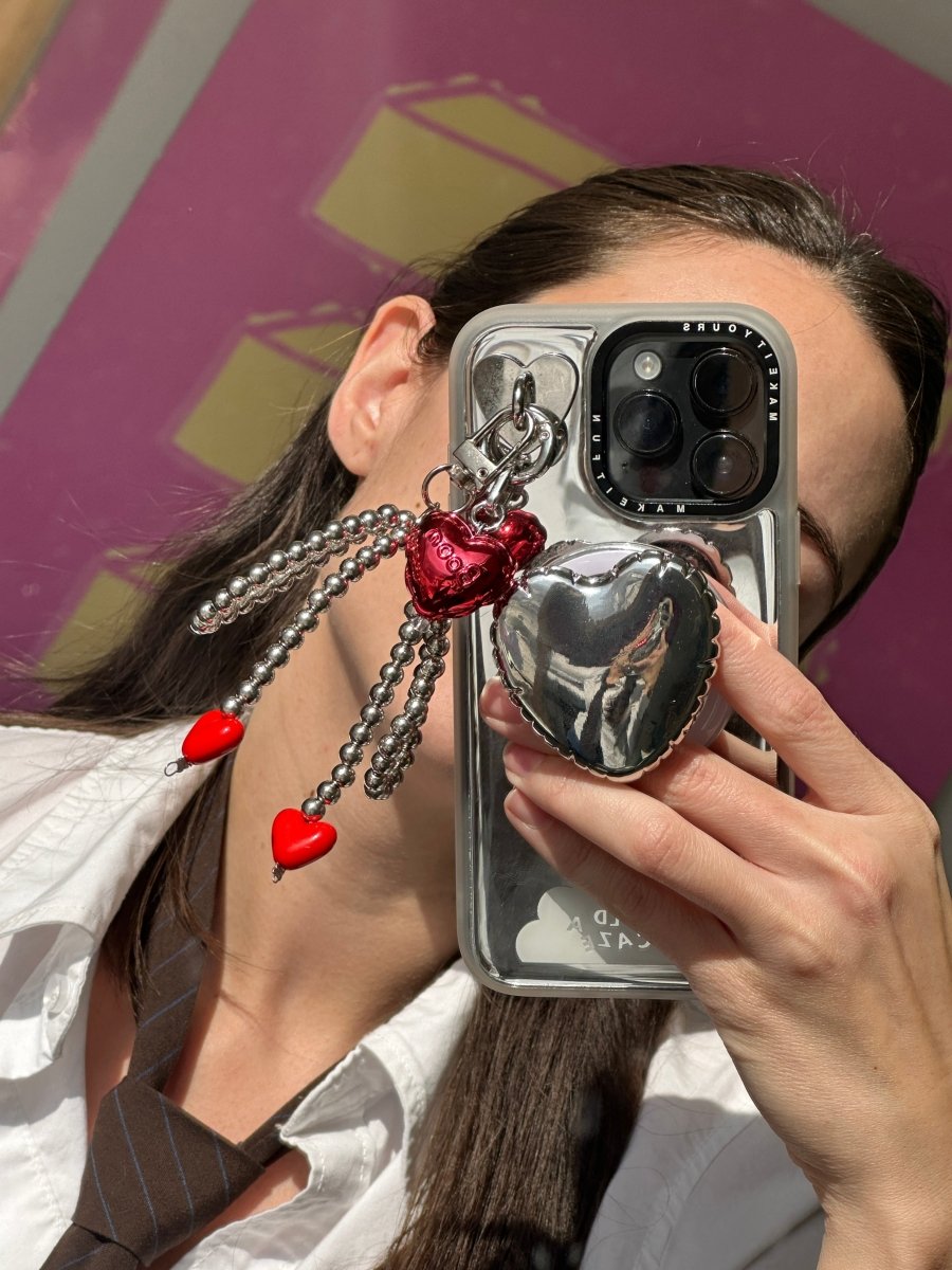 Pretty Tied Up white bow keychain with purple hearts and a pearl string, aesthetic coquette bag charm, cute phone case accessory, feminine ribbon lanyard for keys and backpacks.