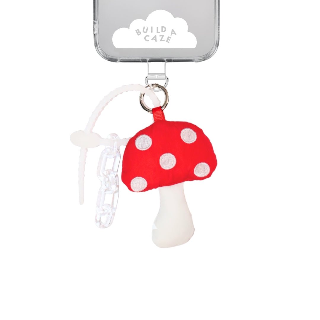Handmade red puffy shroomy keychain for phone cases, cute mushroom bag charm, cottagecore aesthetic mobile accessory, soft plush shroomie attachment for keys and backpacks.