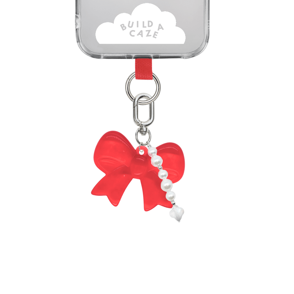 Rouge Baby Bow U Keychain with dainty pearls, red and white bow charm for phone cases, cute aesthetic bag accessory, trendy bow-shaped lip gloss charm attachment.