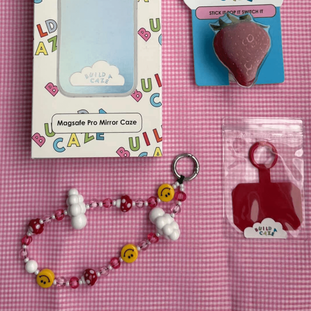 Phone lanyard pink, red, and yellow mushroom and smiley face charms with white cloud beads attaches to any case Build A Caze