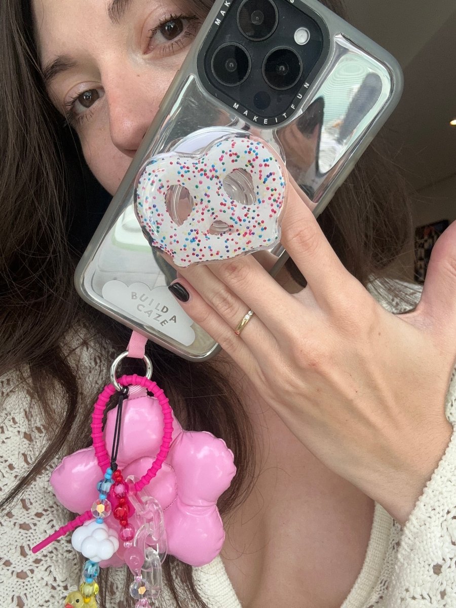 Sprinkle pretzel MagSafe pop holder, cute chocolate dipped pretzel with sprinkles magnetic pop socket and phone grip accessory.