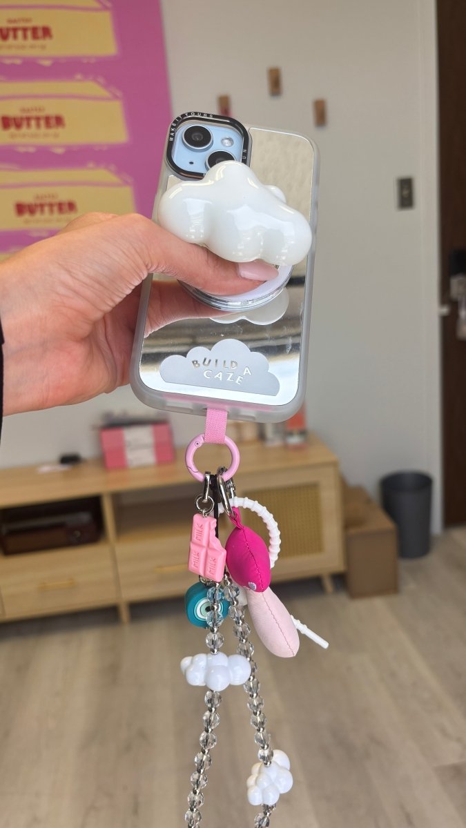 Cute chocolate-dipped strawberry phone charm with a sweet foodie aesthetic, nostalgic Y2K style mobile accessory and decorative tech strap by Build a Caze.