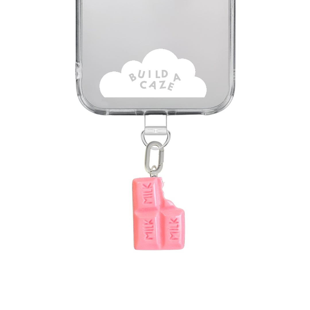 Cute pink strawberry chocolate bar phone charm with a bite mark, sweet food-themed mobile accessory for Y2K aesthetic phone cases and mirror selfies by Build a Caze.