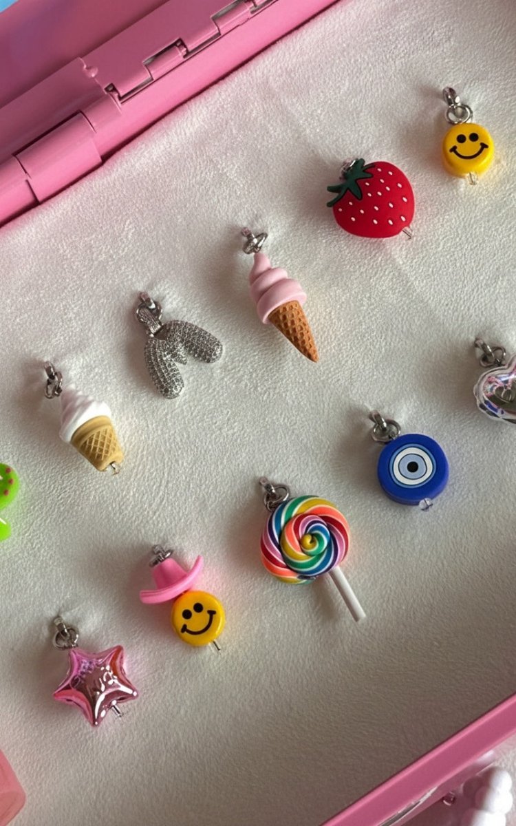 Adorable strawberry ice cream scoop phone charm, cute pink 3D food accessory for mobile cases and Y2K aesthetic tech decoration by Build a Caze.