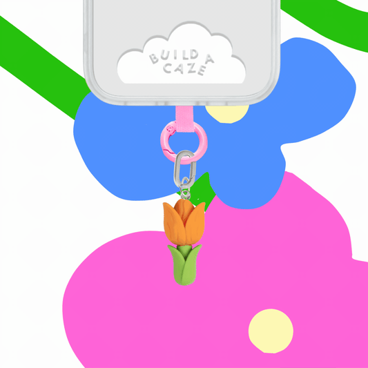 Vibrant tulip charm and floral tech accessory for phone cases. A cute, dangly tulip flower charm compatible with MagSafe cases and phone accessories.
