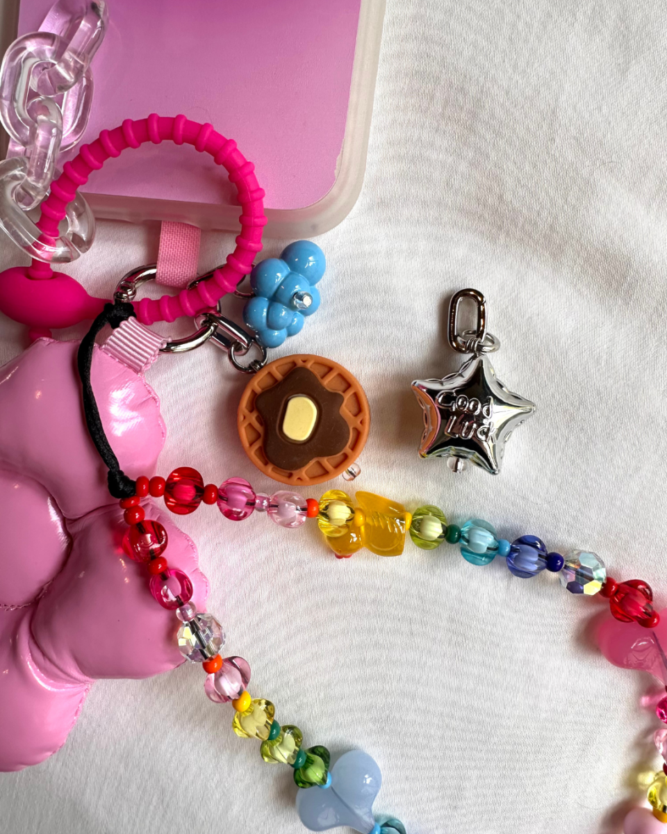 Adorable 3D waffle phone charm with a butter pat detail, quirky food-themed mobile accessory and Y2K aesthetic tech strap by Build a Caze.